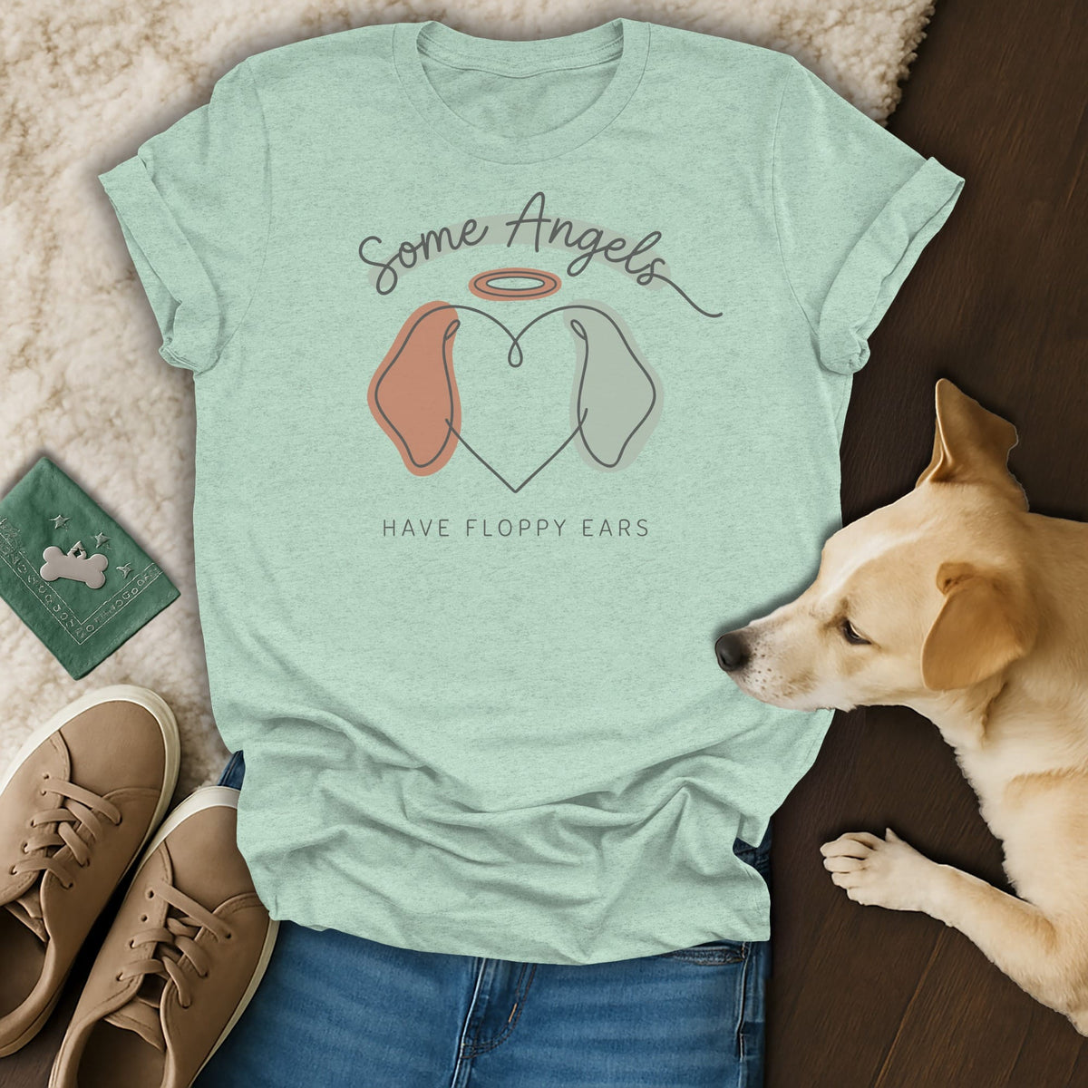 Light blue t-shirt with "Some Angels Have Floppy Ears" text and dog heart graphic.
