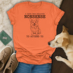 Orange t-shirt with black text and a corgi drawing: "I HAVE DOG-RELATED NONSENSE TO ATTEND TO".