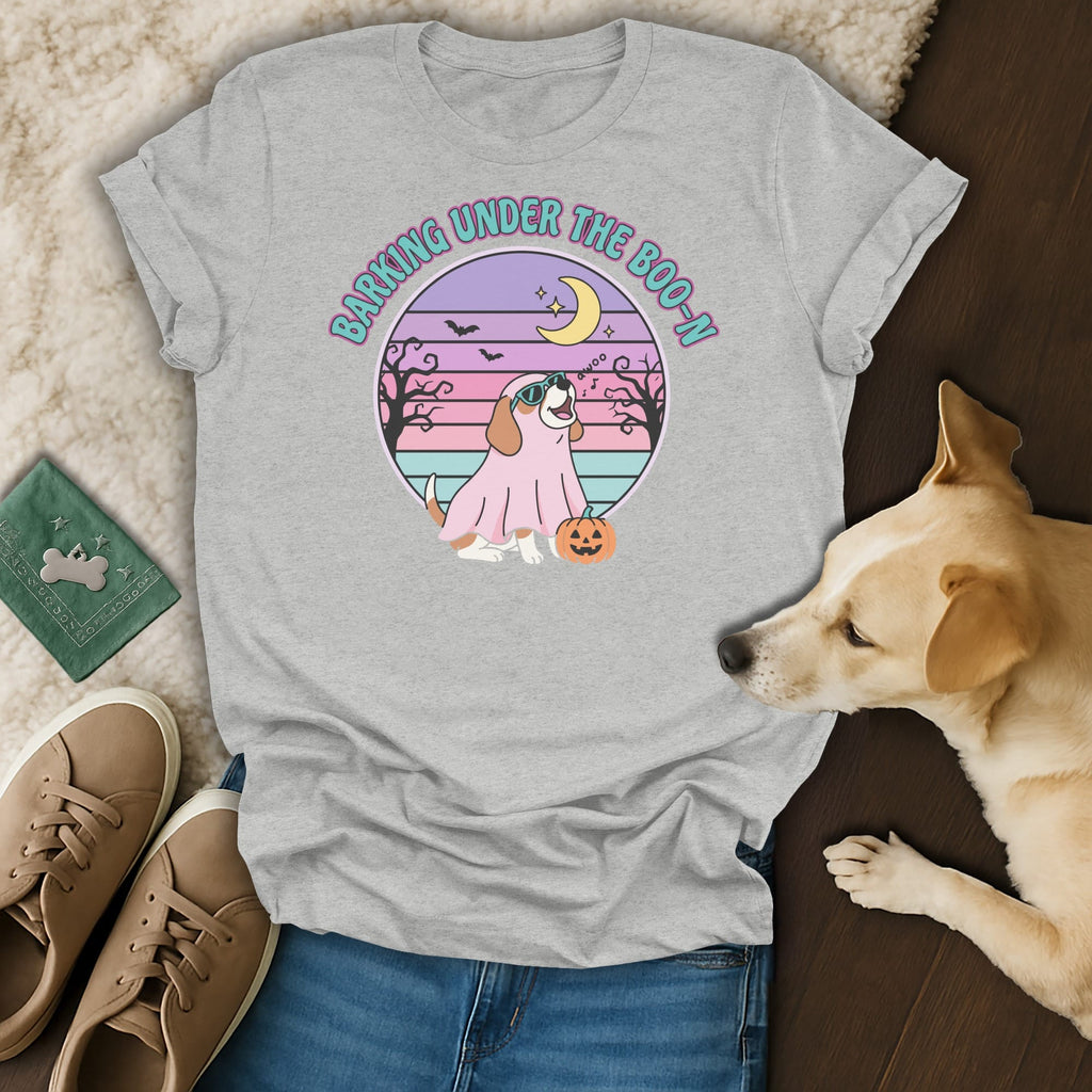 Grey t-shirt with dog in ghost costume and text "Barking Under the Boo-n"
