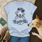 Golden retriever wearing a sailor hat, with "MY BOATING SHIRT" text.