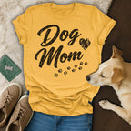 Yellow t-shirt with "Dog Mom" text and paw prints.