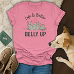 Pink t-shirt with graphic of dog on back, text "Life Is Better BELLY UP".