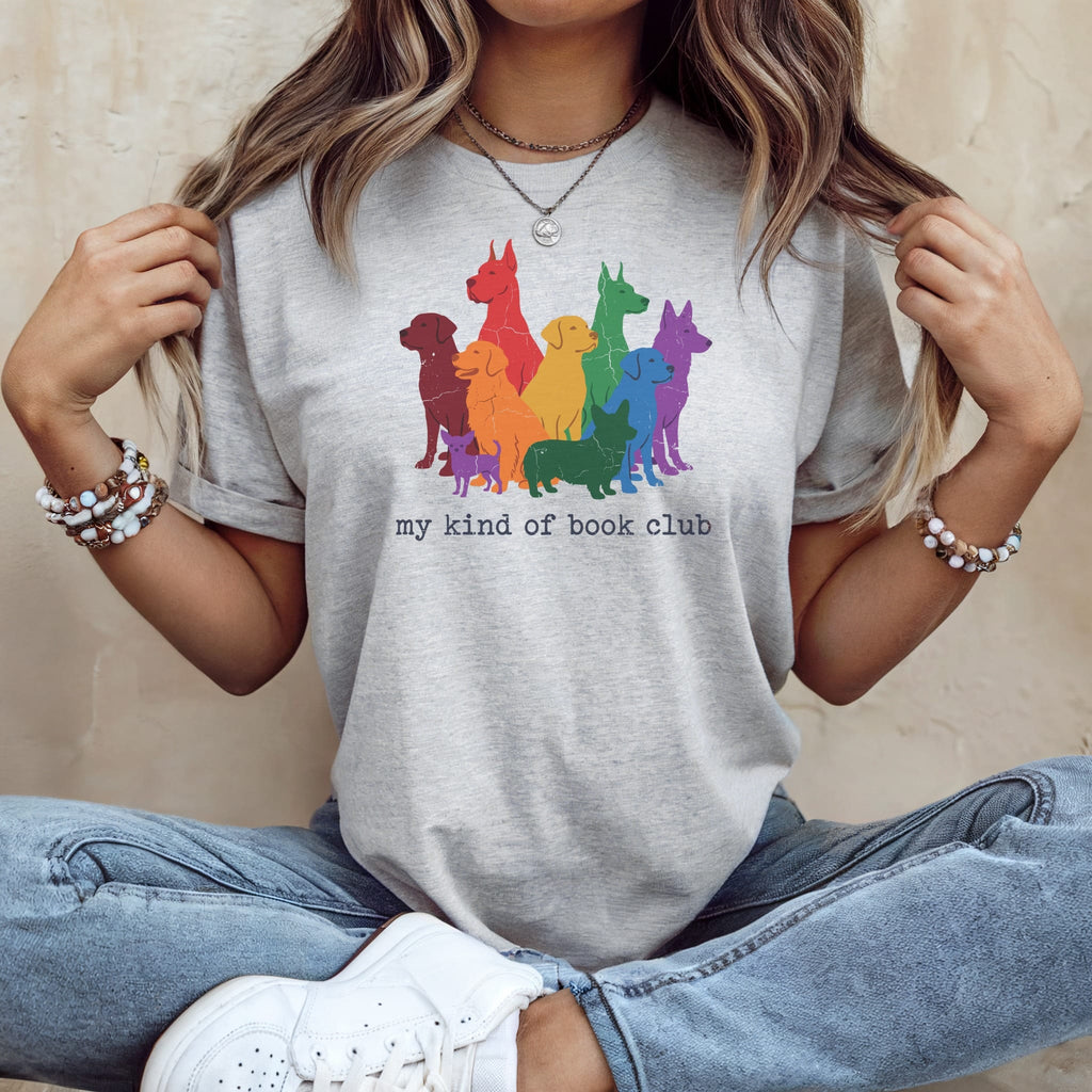 Grey t-shirt with rainbow dog silhouettes and text "my kind of book club."
