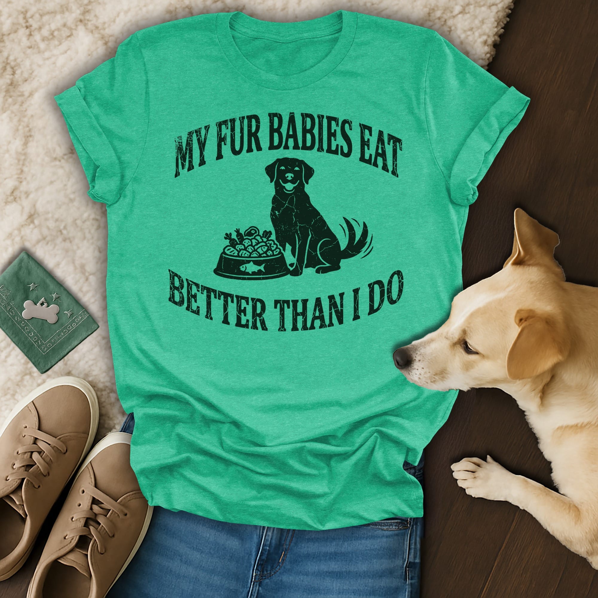 Green t-shirt with black text that reads "My fur babies eat better than I do" and a dog graphic.