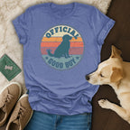 Distressed circle logo with "OFFICIAL GOOD BOY" text on a blue t-shirt.