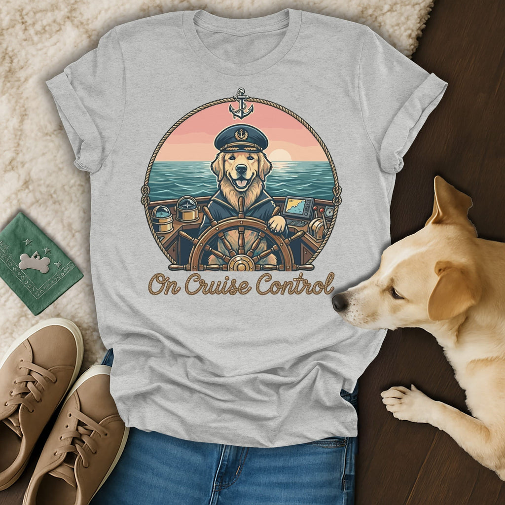 Golden retriever in captain's hat at ship's wheel, text "On Cruise Control".