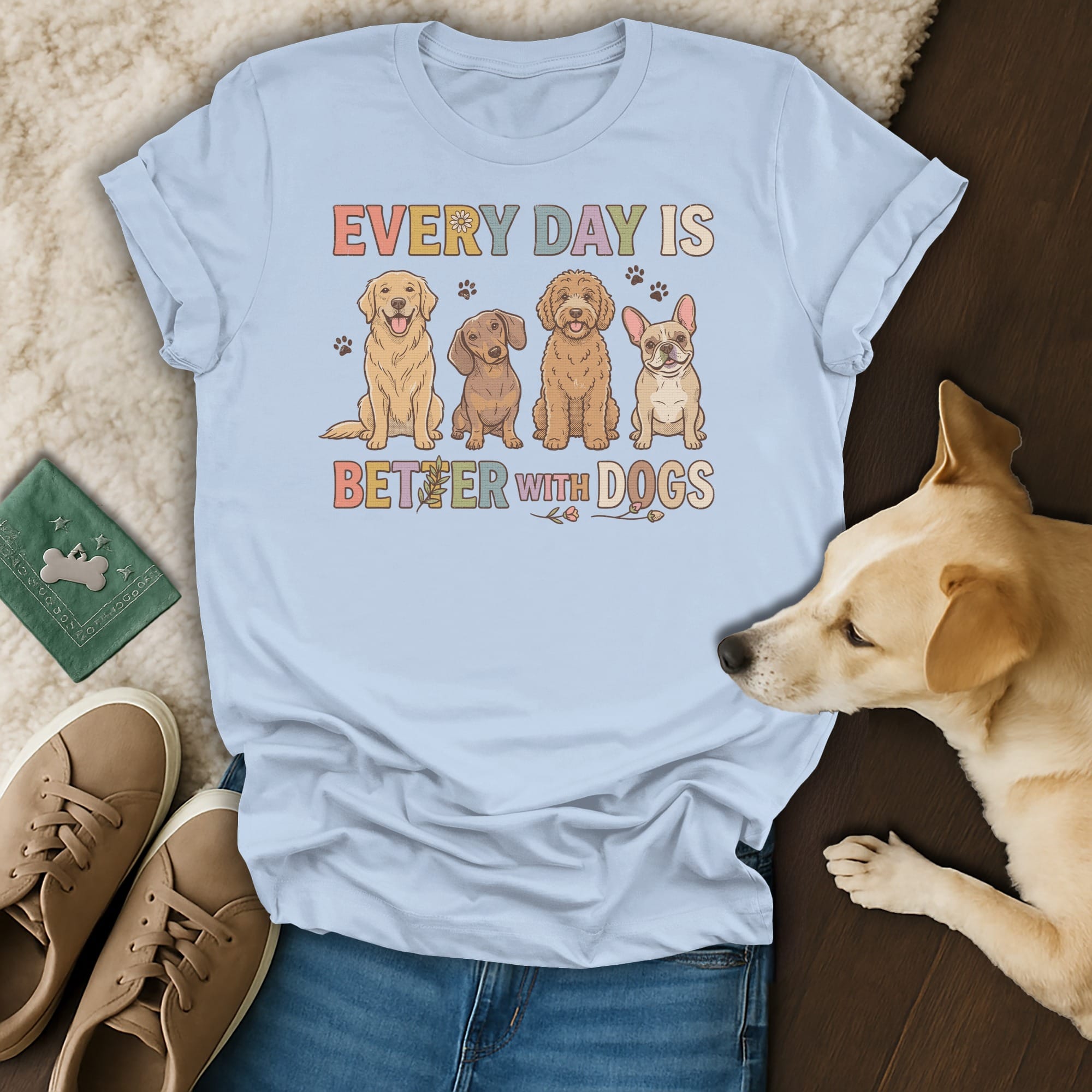 Light blue t-shirt with four dogs and text "Every Day is Better with Dogs".