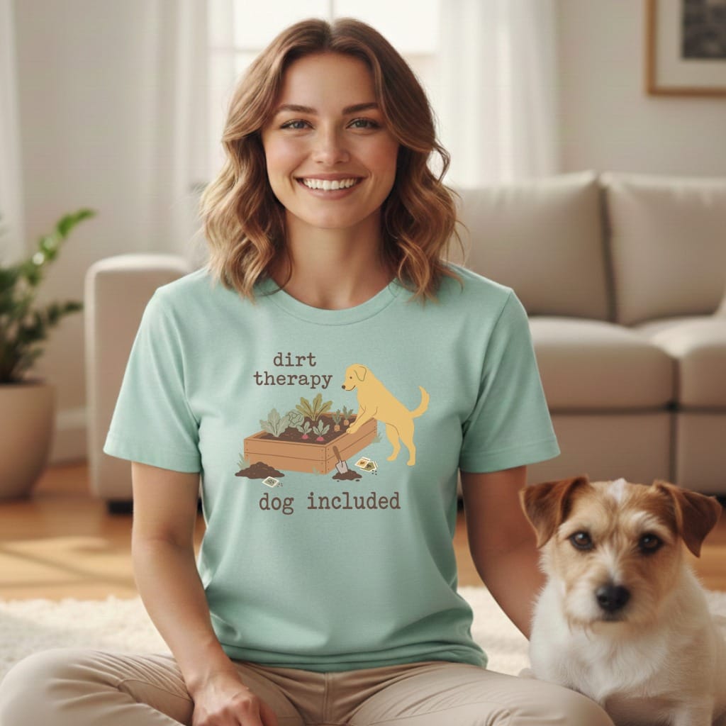 Light blue t-shirt with "dirt therapy dog included" graphic featuring a dog and garden box.
