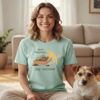 Light blue t-shirt with "dirt therapy dog included" graphic featuring a dog and garden box.