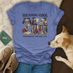 Blue t-shirt with "Founding Fidos" and historical dog illustrations.