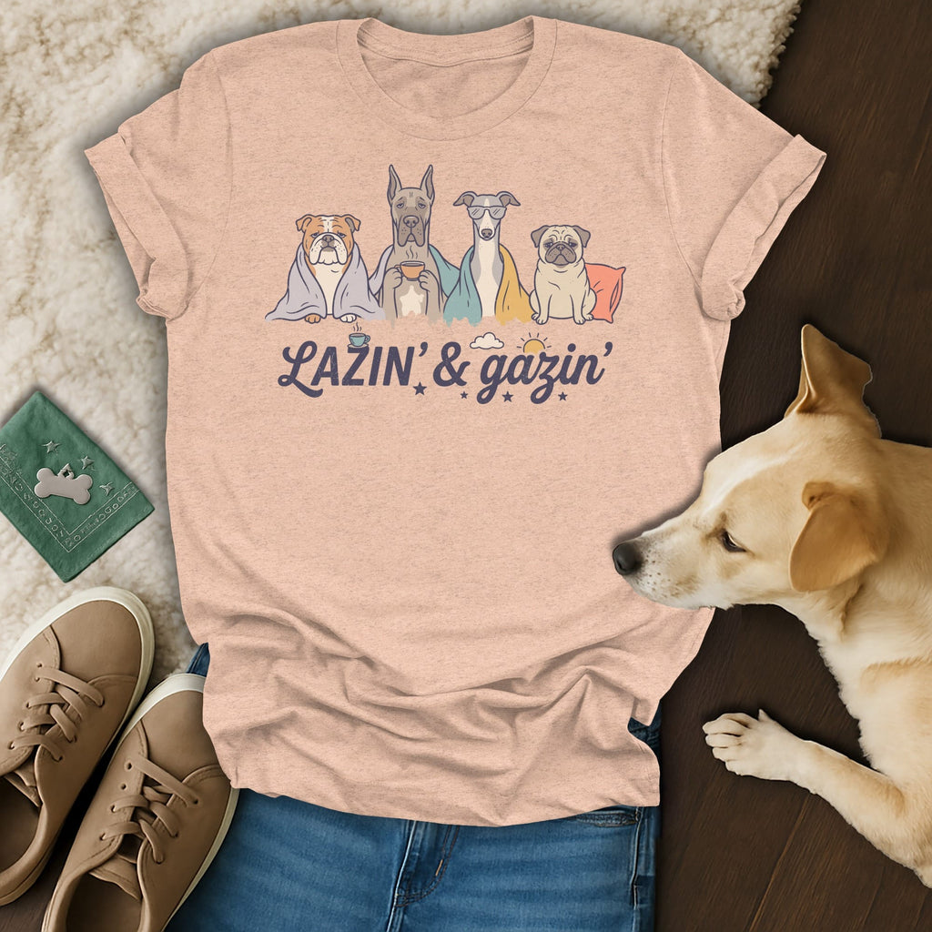 T-shirt with cartoon dogs "LAZIN' & gazin'" text and dog accessories.