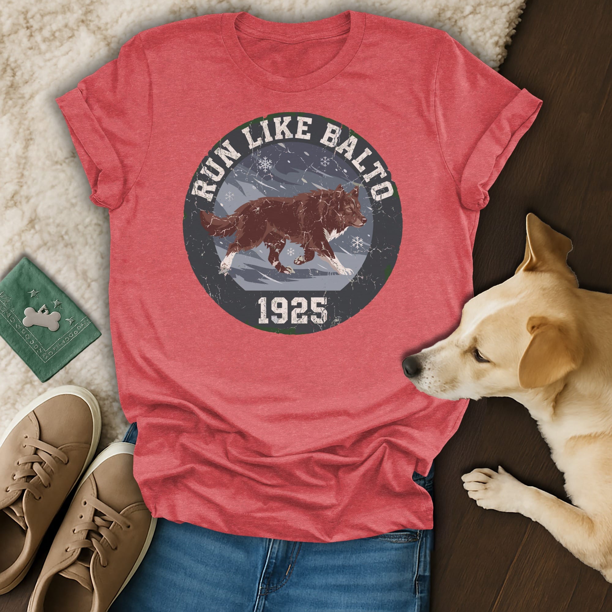 Red t-shirt with "Run Like Balto 1925" text and a running dog graphic.