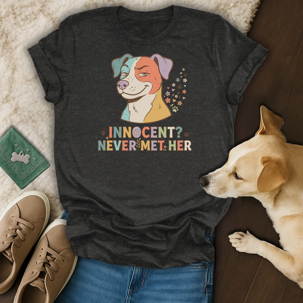 Dark grey t-shirt with a colorful dog graphic and text "INNOCENT? NEVER MET HER".