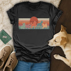 T-shirt with retro sunset dog silhouette graphic.