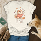 Cream t-shirt with animated dog graphic and text "Fur-st Day of Fall."