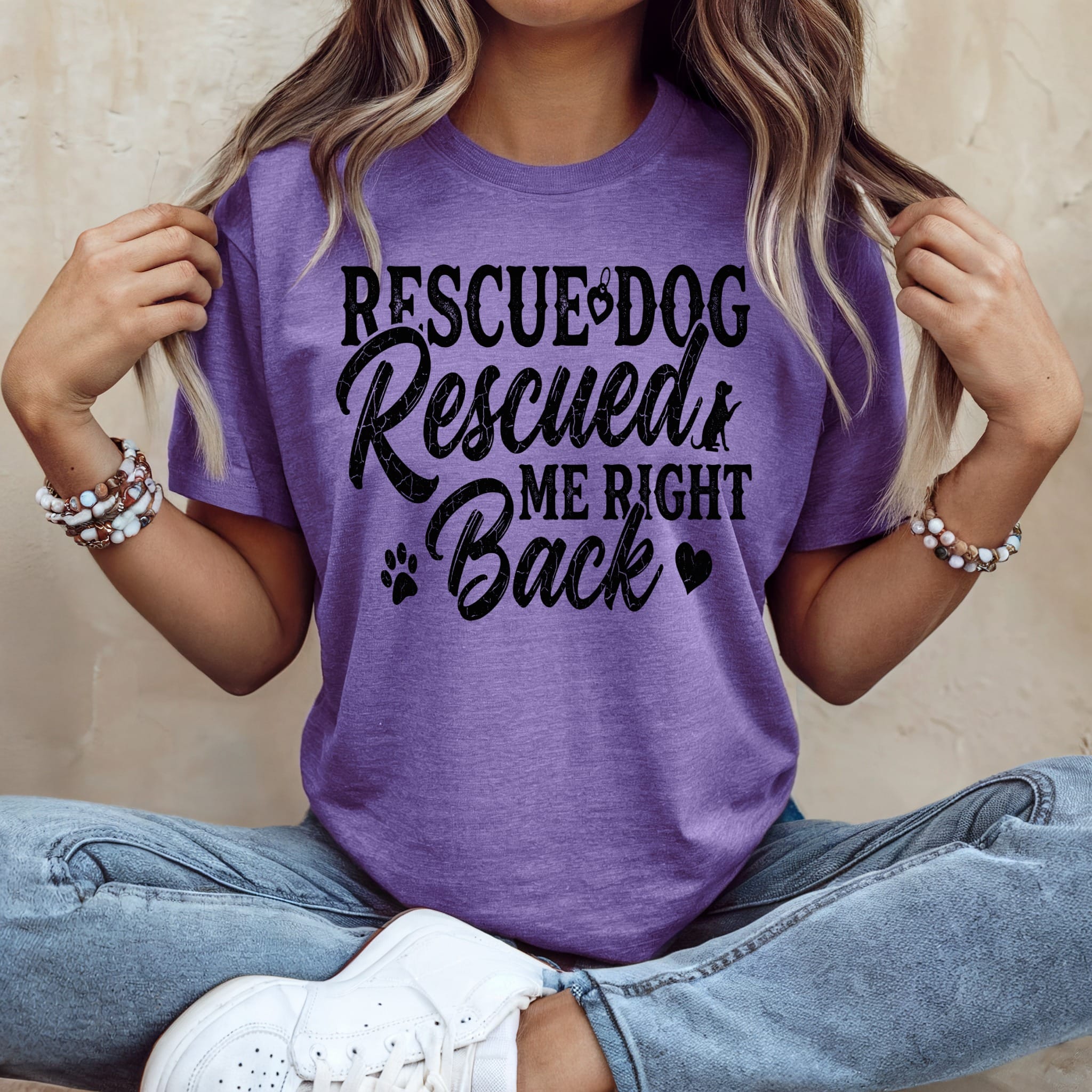 Purple t-shirt with "Rescue Dog Rescue Me Right Back" text and paw print.