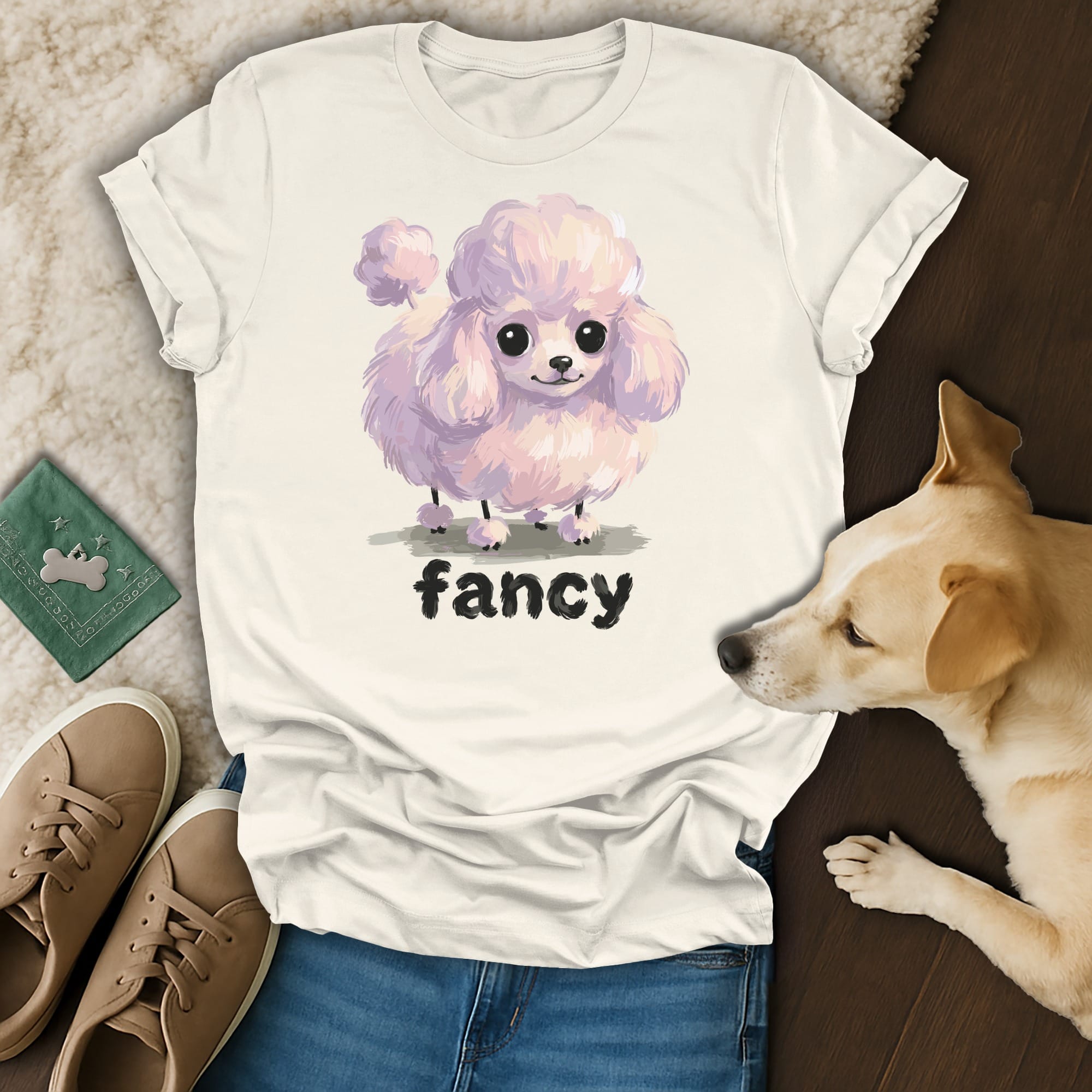 White t-shirt with a cute pink poodle graphic and the word "fancy".