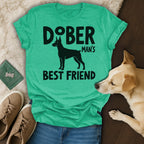Green t-shirt with "Doberman's Best Friend" text and Doberman silhouette.