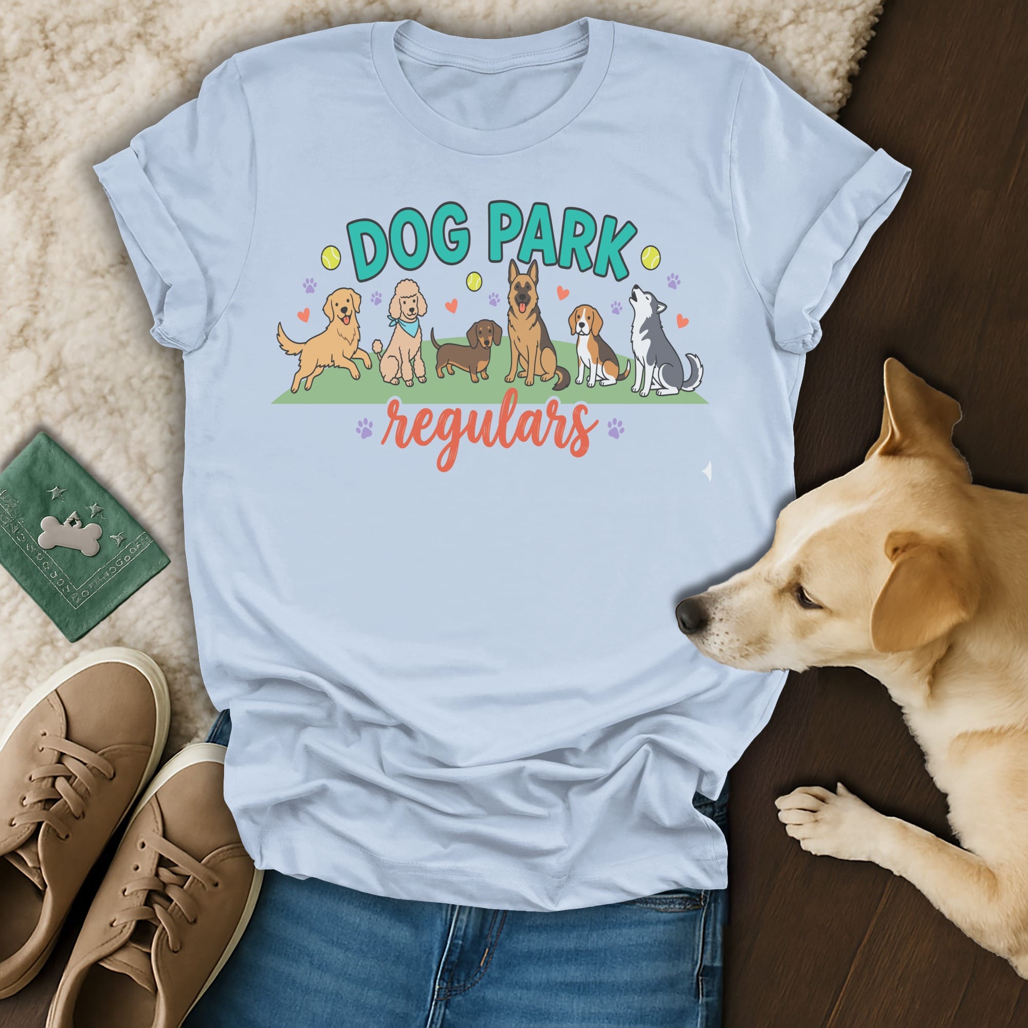 Light blue t-shirt with "DOG PARK regulars" text and cartoon dogs.
