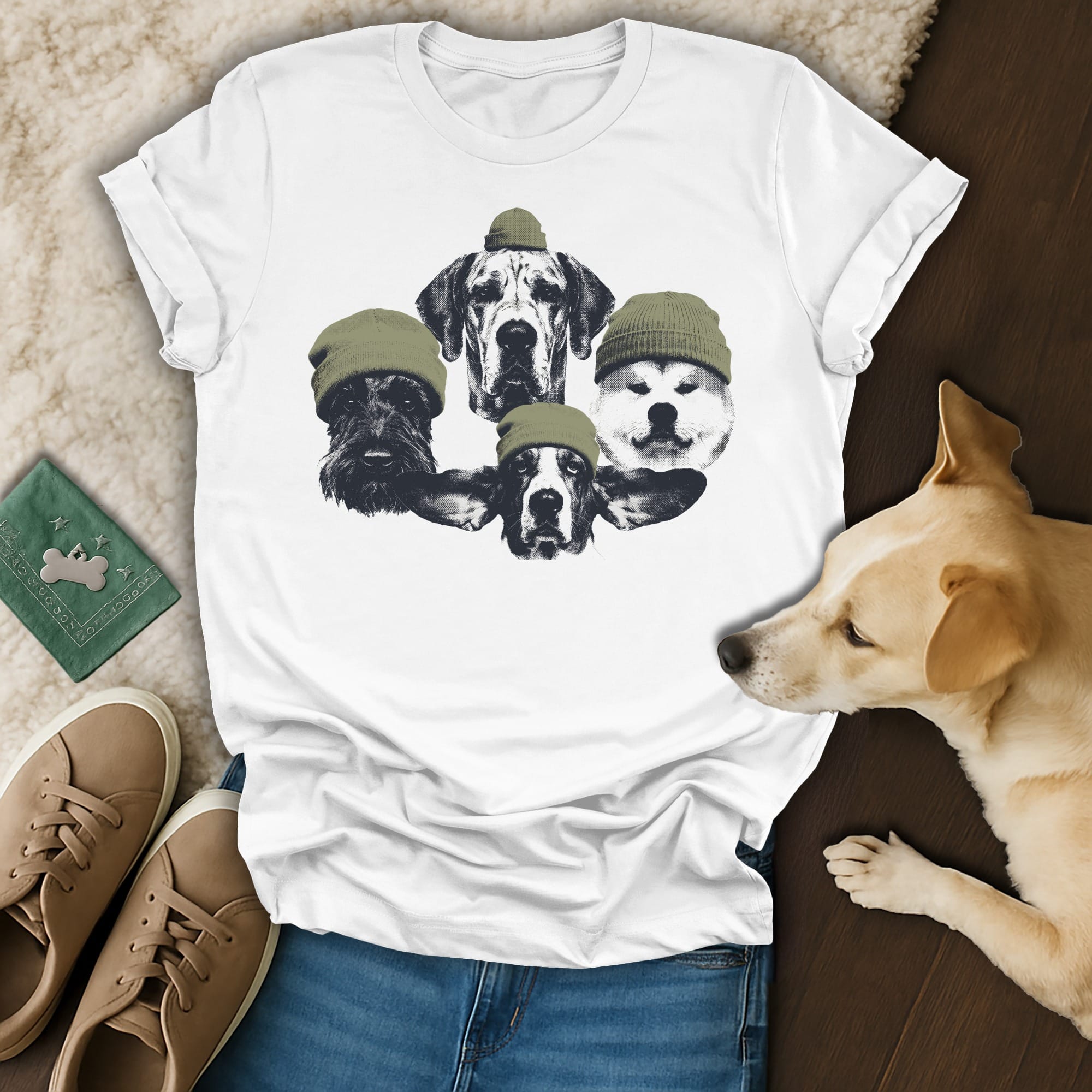 Five dogs wearing green beanies on a white t-shirt.