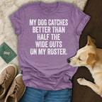Purple t-shirt with white text "My dog catches better than half the wide outs on my roster."