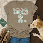 T-shirt with text "All I Need Is The Beach" and a cartoon dog.