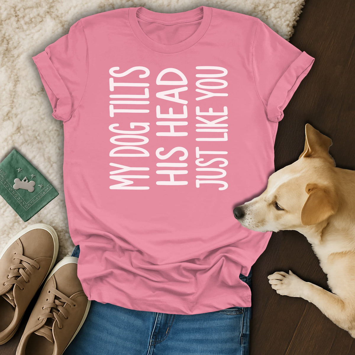 Pink t-shirt with white text "MY DOG TILTS HIS HEAD JUST LIKE YOU."