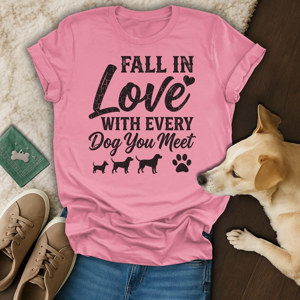 Pink t-shirt with "Fall In Love With Every Dog You Meet" text and dog silhouettes.
