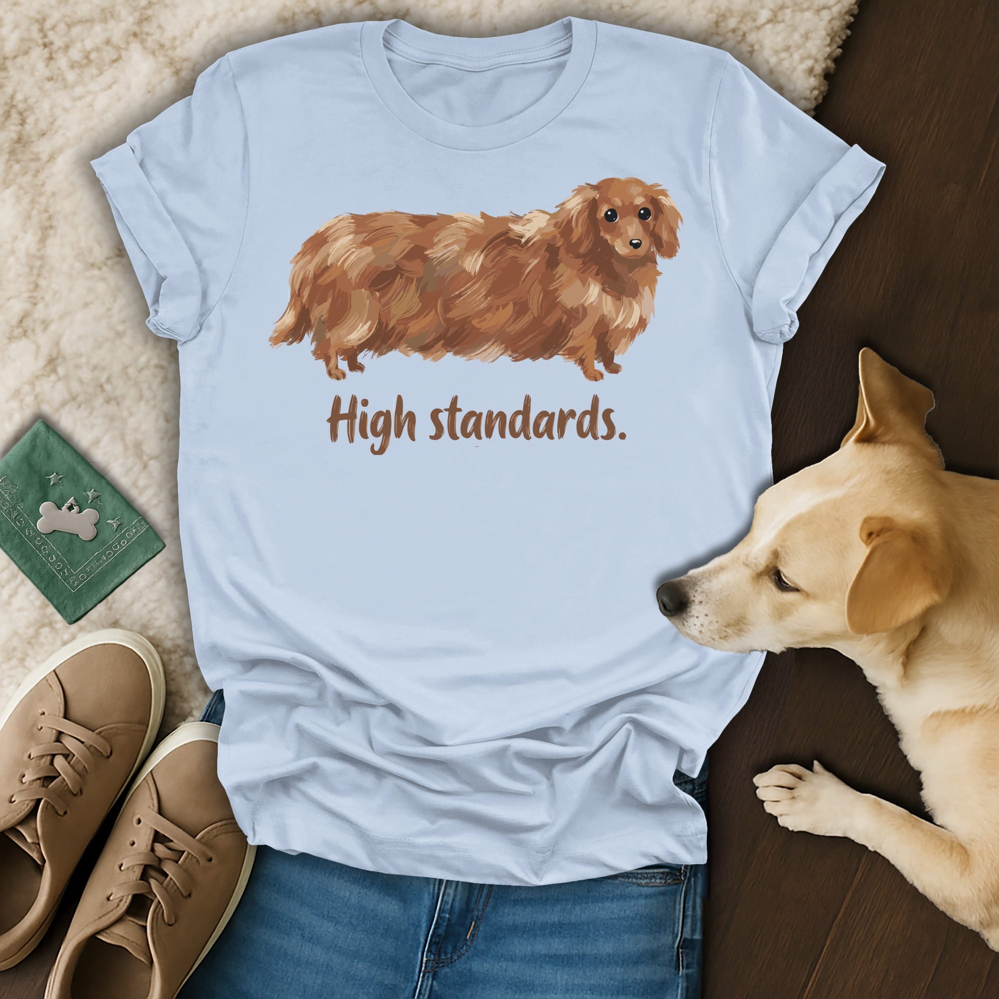 Light blue t-shirt with dachshund illustration and text "High standards."