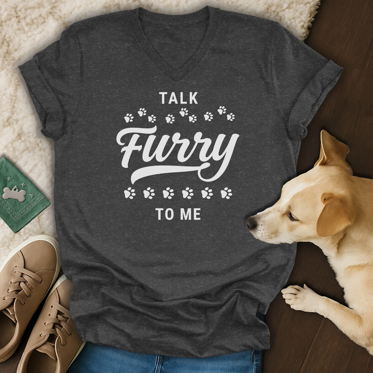 Dark grey v-neck t-shirt with "Talk Furry To Me" text and paw prints.