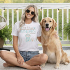White t-shirt with "All I Need Is The Beach" and dog graphic.