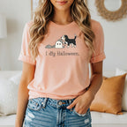 Peach t-shirt with cartoon dog digging ghost and text "I dig Halloween."