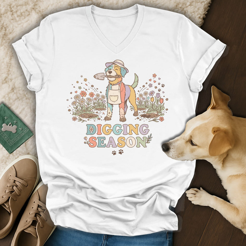 T-shirt with colorful dog, shovel, and "Digging Season" text.