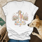 T-shirt with colorful dog, shovel, and "Digging Season" text.