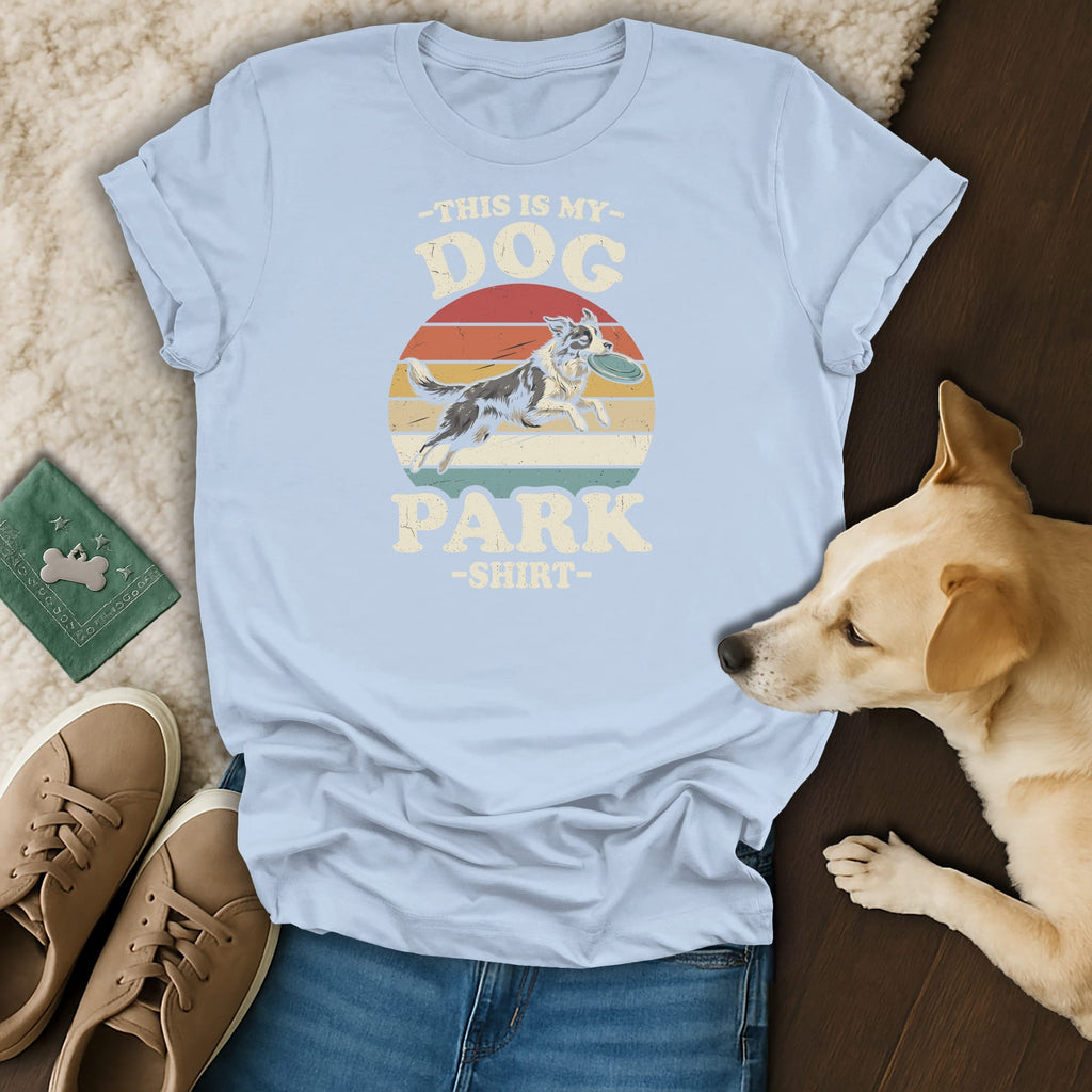 Light blue t-shirt with "This is my dog park shirt" and dog playing frisbee graphic.