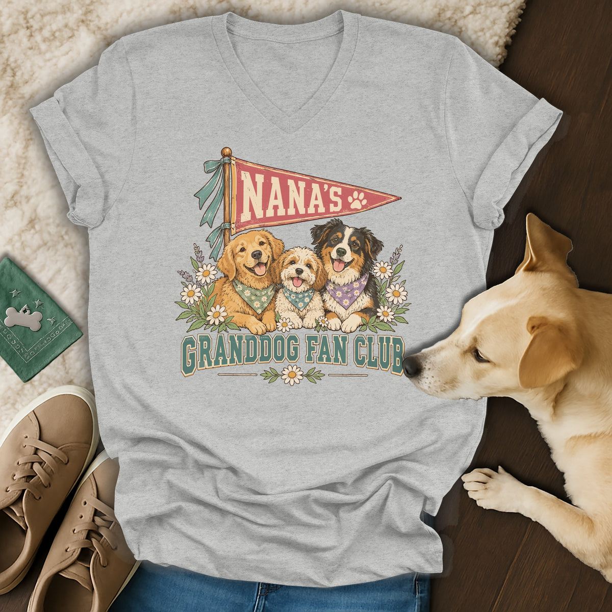 Grey V-neck t-shirt featuring a Nana's Granddog Fan Club graphic with three dogs, surrounded by flowers.