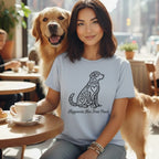 Woman and golden retriever wearing light blue t-shirt with dog heart design.
