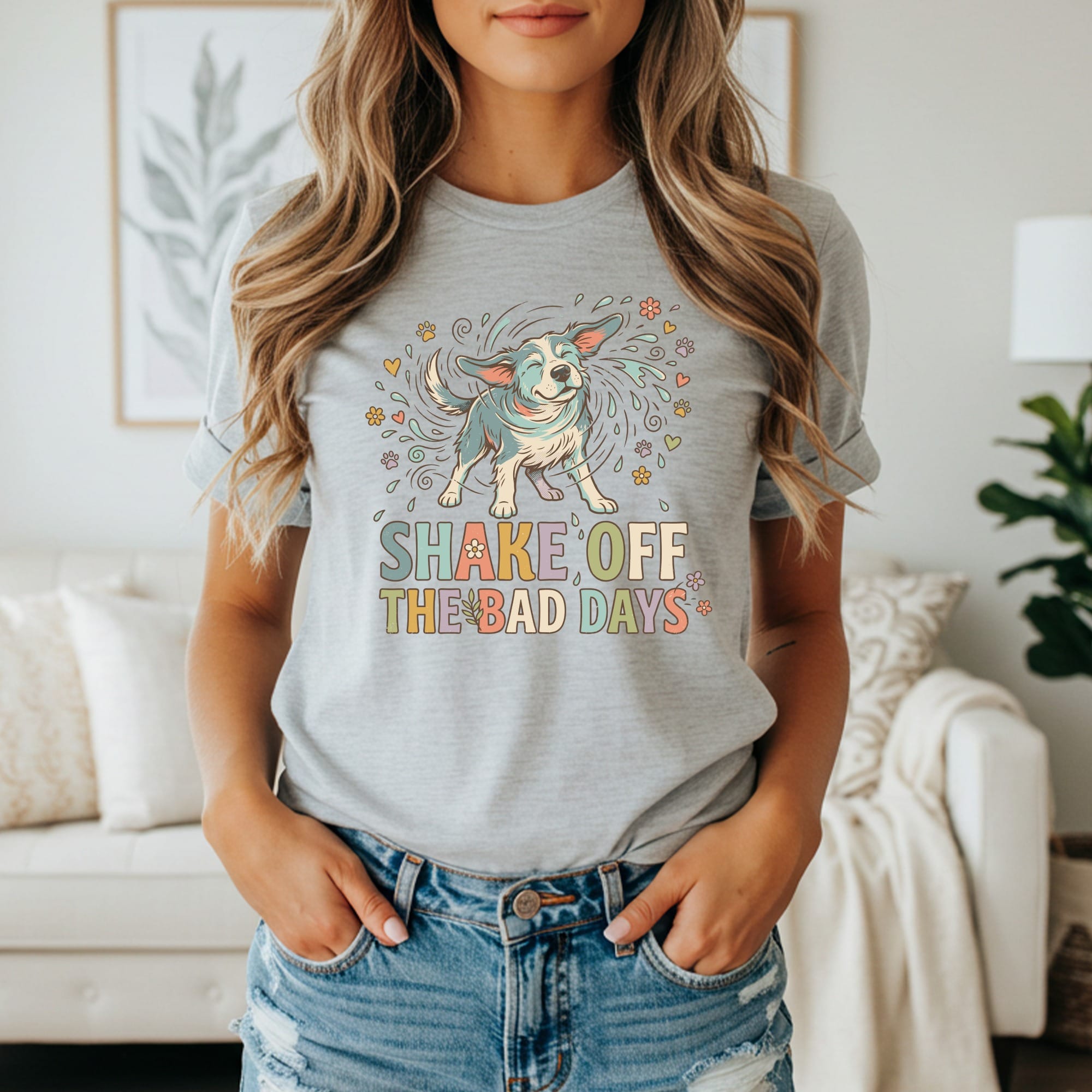Grey t-shirt with cartoon dog shaking off water and text "SHAKE OFF THE BAD DAYS".