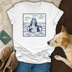 T-shirt featuring a line drawing of a dog wearing goggles in an inner tube.