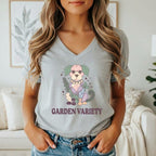 Grey t-shirt with a graphic of a dog surrounded by plants and the text "GARDEN VARIETY".