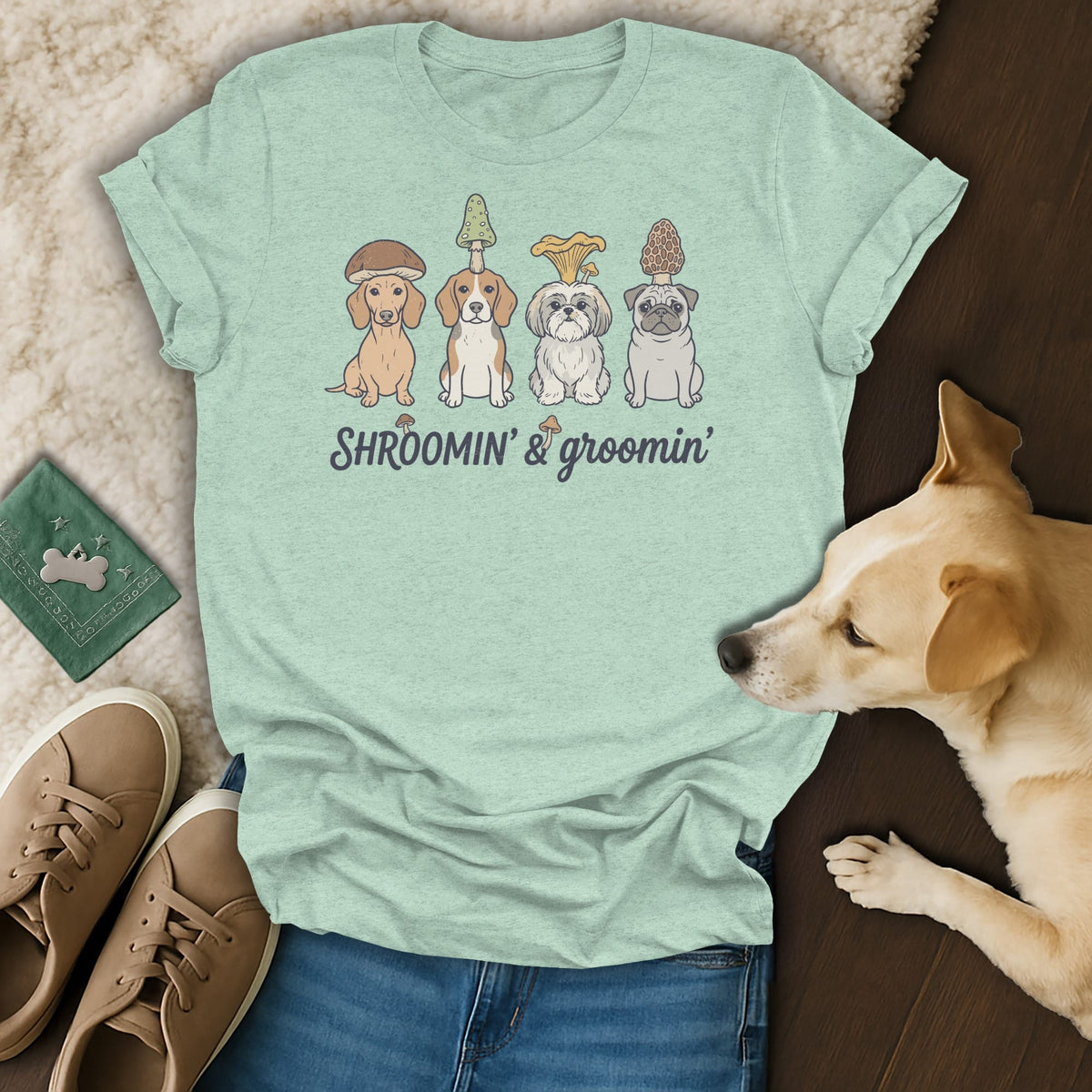 T-shirt with four dogs wearing mushroom hats and text "SHROOMIN' & groomin'".