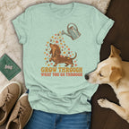 Light green t-shirt with a dachshund graphic and the text Grow Through What You Go Through.