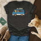 T-shirt with dogs riding in a blue van with hearts and a bone on the roof.
