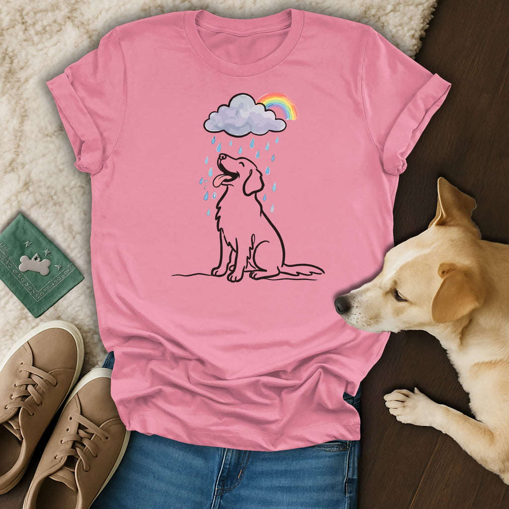 Pink t-shirt with a line drawing of a happy dog under a rainbow cloud.