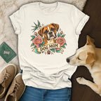 A white t-shirt featuring a tattoo-style Boxer dog graphic, roses, a swallow, and the text DOG MOM.