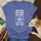 Blue t-shirt with white text "Can't Help Falling In Love With Every Dog I See."