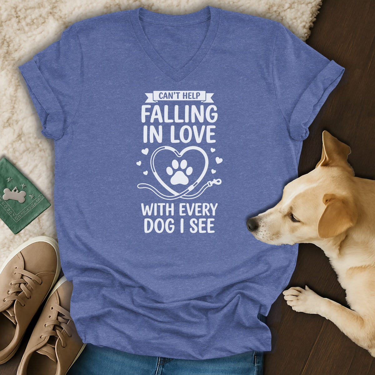 Blue t-shirt with white text "Can't Help Falling In Love With Every Dog I See."
