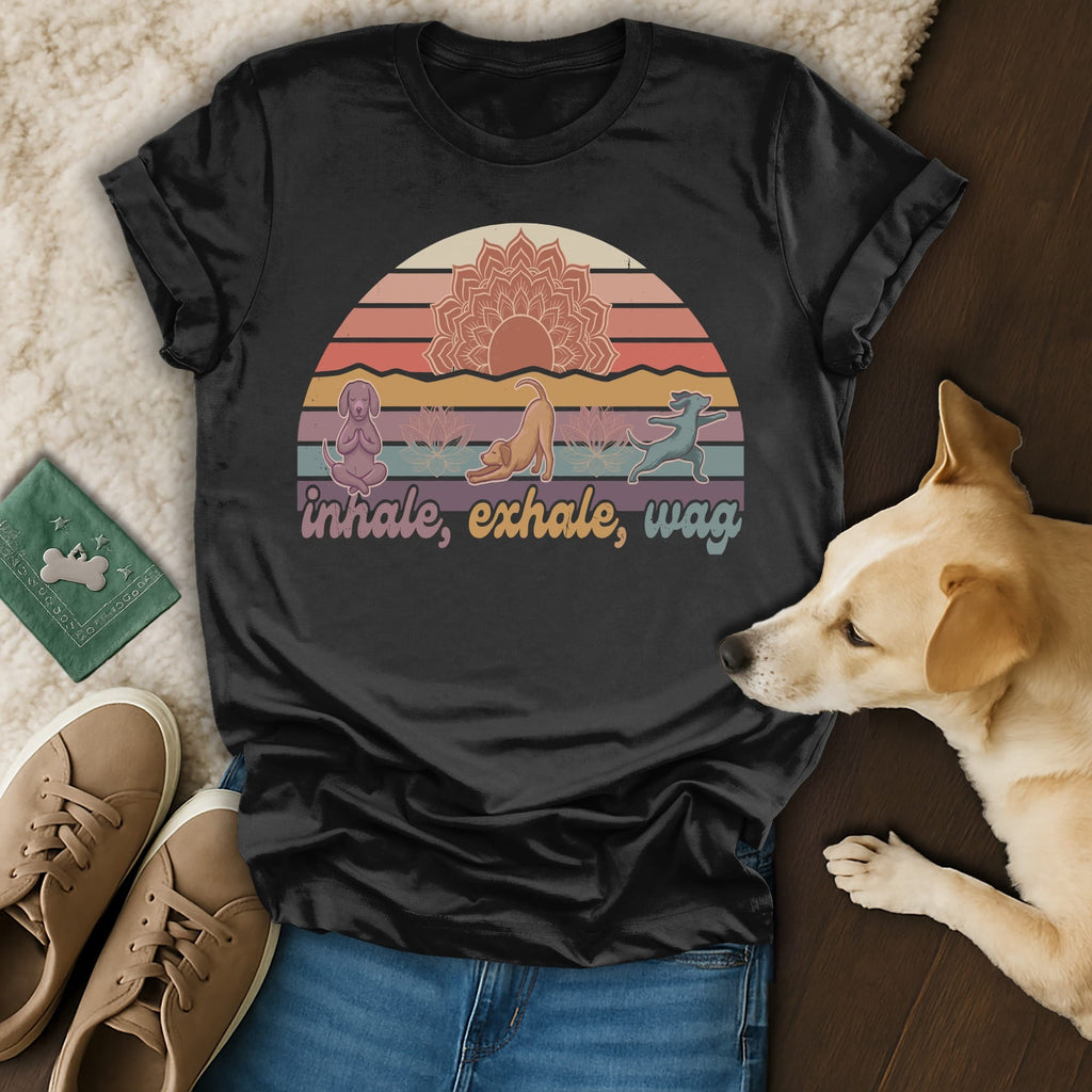 Black t-shirt with "inhale, exhale, wag" text and sunset yoga dog graphic.