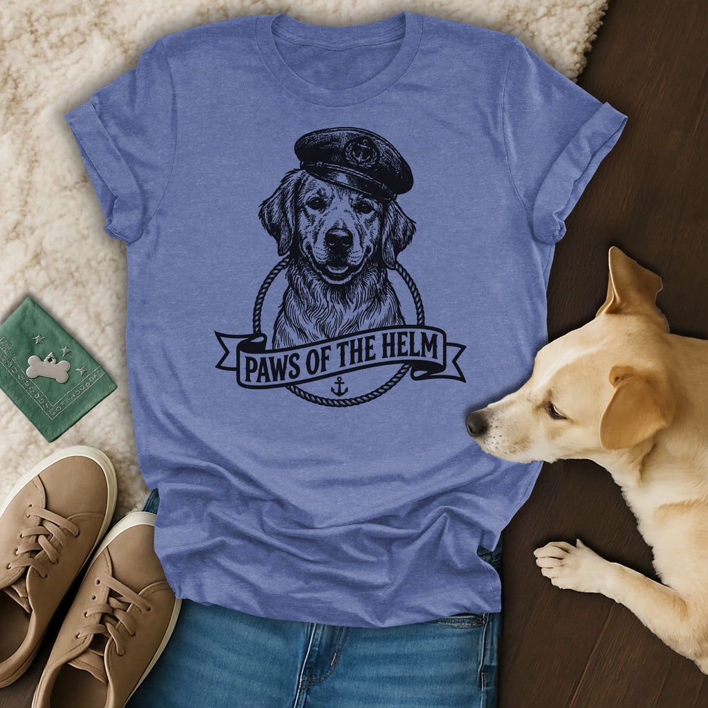 Golden retriever wearing a captain's hat on a t-shirt, "Paws of the Helm" text.