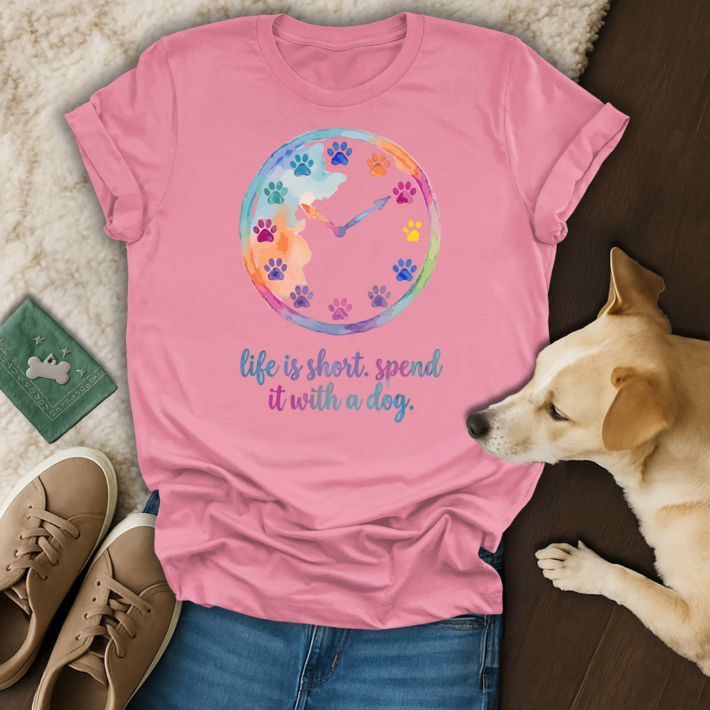 Pink t-shirt with watercolor clock face and dog paw prints, reads "life is short. spend it with a dog."